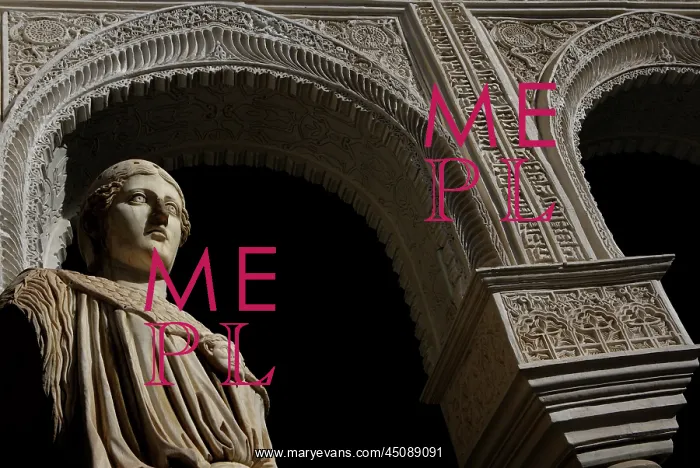 : Seville. Low angle view of a Roman statue of Minerva in the Central Patio : Seville. Low angle view of a Roman statue of Minerva in the Central Patio