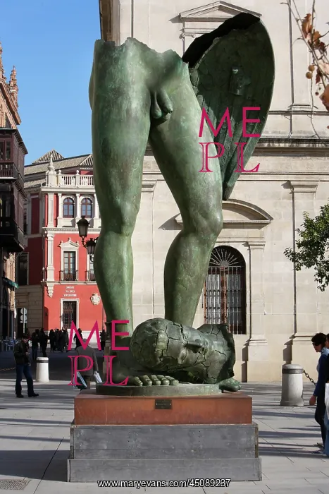 : Seville. Low angle view of sculpture, Gambe Alate : Seville. Low angle view of sculpture, Gambe Alate