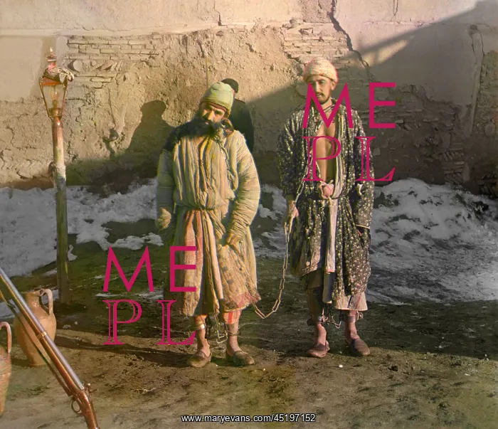 : Two shackled prisoners in Central Asian ? : Two shackled prisoners in Central Asian ?