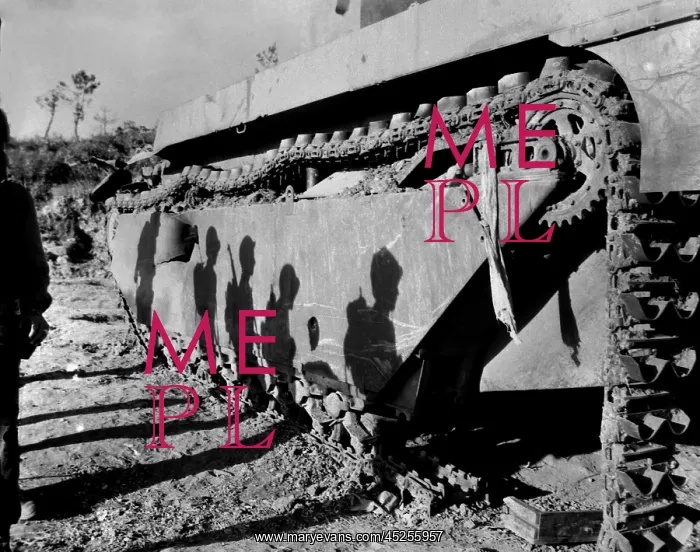 : Shadows of 6th Division Marines on a battle-wrecked : Shadows of 6th Division Marines on a battle-wrecked