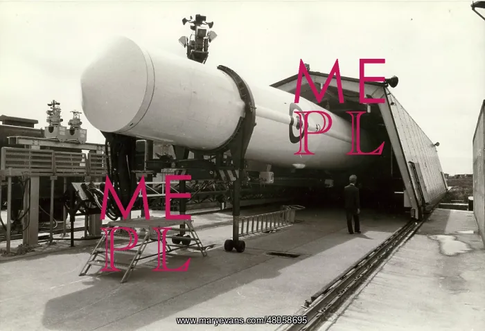 : The shed containing a Thor IRBM rolls back on rails : The shed containing a Thor IRBM rolls back on rails