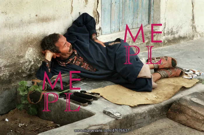 : Shoe shine man in a shady spot - Houmt Souk, Djerba, Tunisia : Shoe shine man in a shady spot - Houmt Souk, Djerba, Tunisia