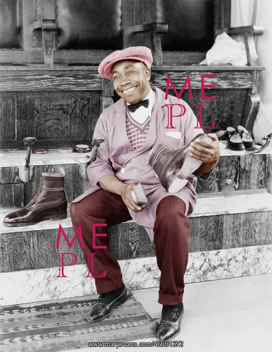 : Shoeshine man working and smiling : Shoeshine man working and smiling