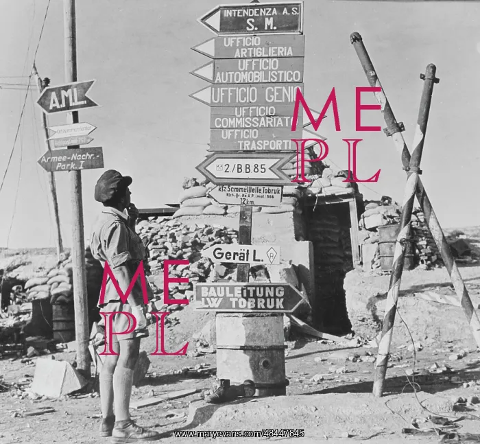 : Sign posts printed in German and Italian at : Sign posts printed in German and Italian at