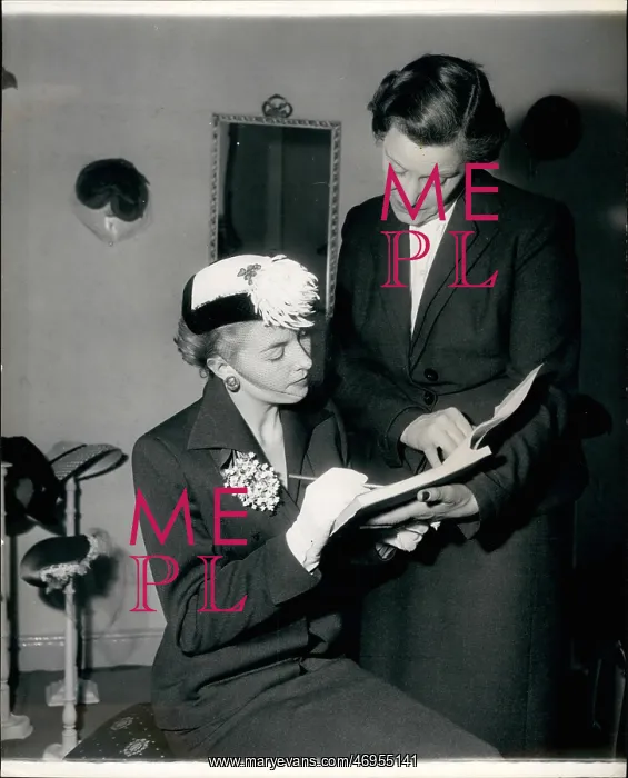: Signing for a hat at the Hat Library : Signing for a hat at the Hat Library