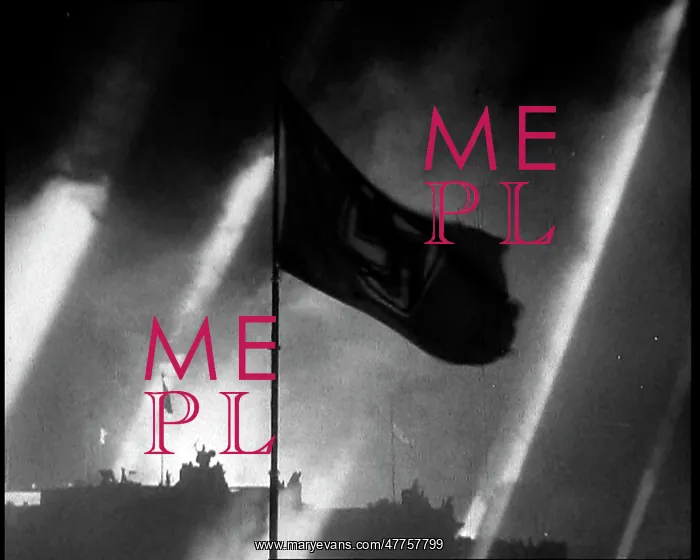  : A Silhouette of a Waving Flag Against an Illuminated