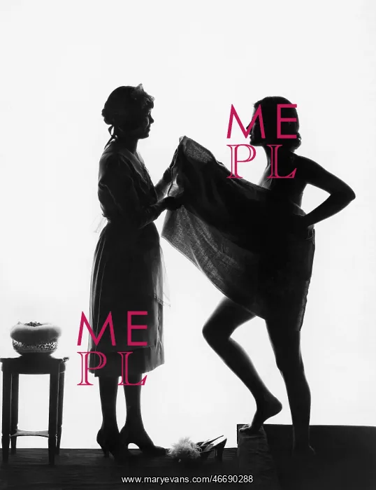  : Silhouette of two women with a bath towel