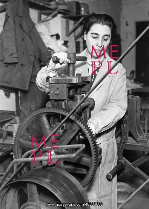 : Silversmith at work, 1932 : Silversmith at work, 1932
