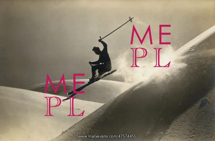  : A skier performing stunts downhill
