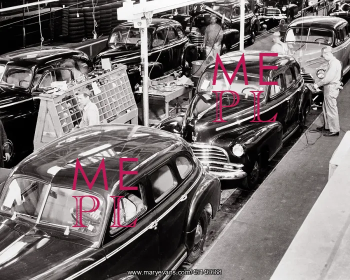 : Skilled Crew of Anonymous Men Working on Automobile : Skilled Crew of Anonymous Men Working on Automobile