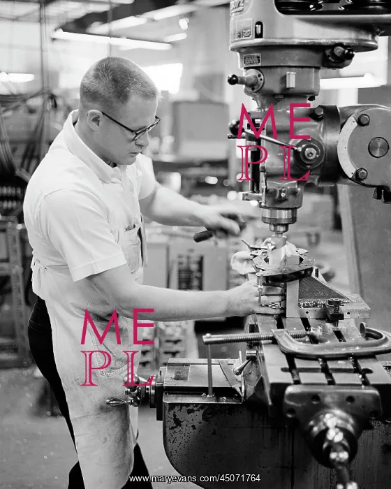 : Skilled Man Machinist Operating a Horizontal Milling : Skilled Man Machinist Operating a Horizontal Milling