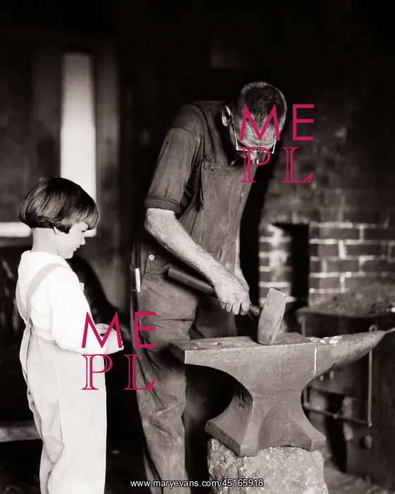 : Small Boy Watching a Man Working on Blacksmith'S : Small Boy Watching a Man Working on Blacksmith'S