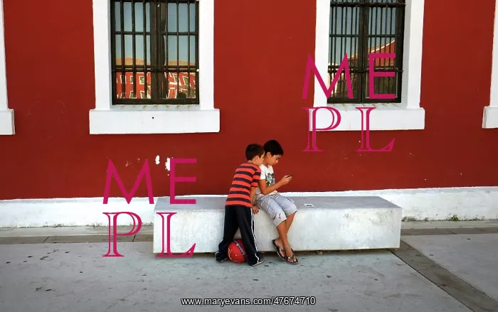 : Two small boys look in the Placa de s'Esplanada, Es Castell : Two small boys look in the Placa de s'Esplanada, Es Castell