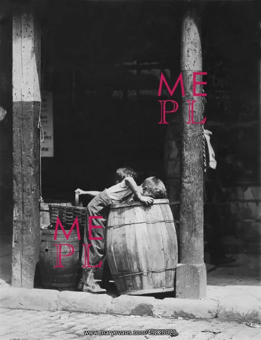  : Small boys picking from barrels, from original ?