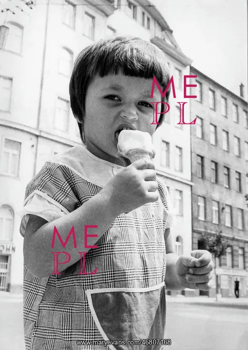 : Small child eats an ice cream : Small child eats an ice cream