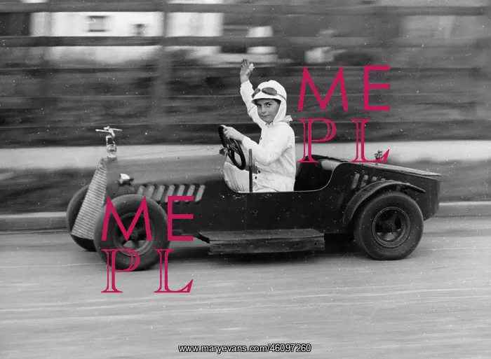 : A small motor car complete with a : A small motor car complete with a