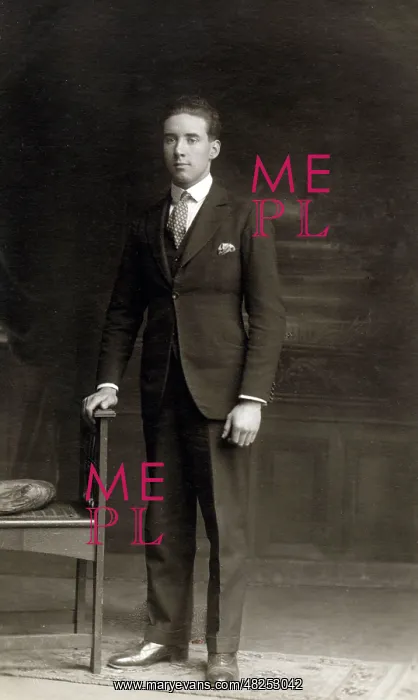 : Smart young man posing for a Studio photograph : Smart young man posing for a Studio photograph