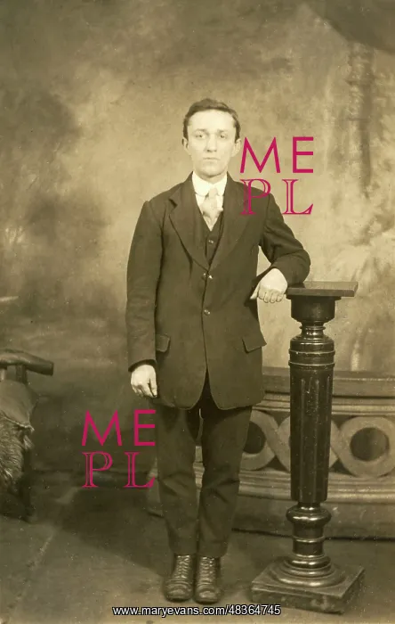  : A smartly dressed teenage boy