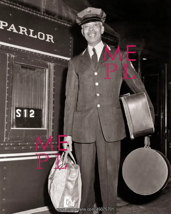 : Smiling African American Man Looking at Camera : Smiling African American Man Looking at Camera