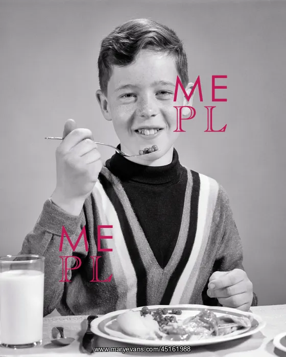 : Smiling Boy Looking at Camera Eating a Forkful : Smiling Boy Looking at Camera Eating a Forkful