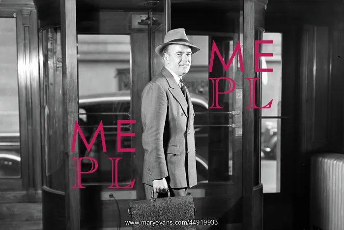 : Smiling businessman in hat double breasted suit : Smiling businessman in hat double breasted suit