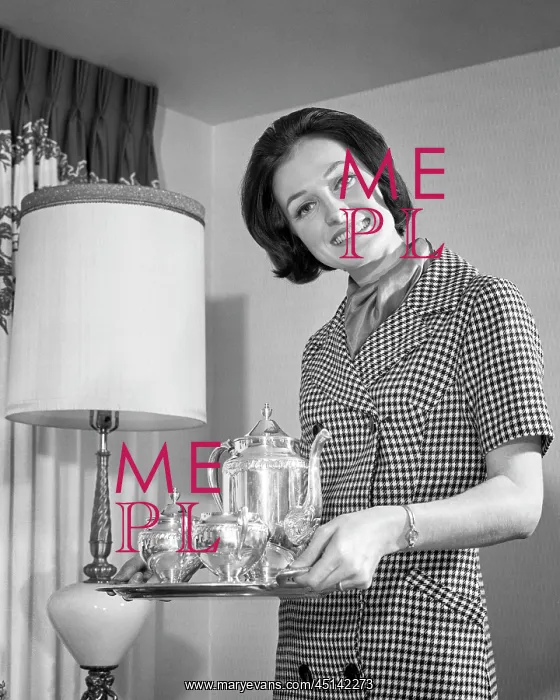 : Smiling Dark Haired Woman Hostess Looking at Camera : Smiling Dark Haired Woman Hostess Looking at Camera