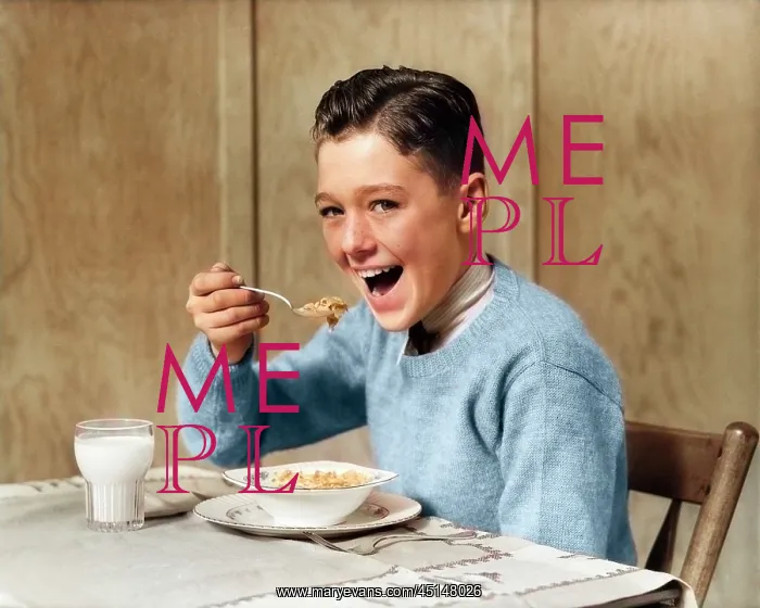 : Smiling Hungry Boy Looking at Camera Eating Breakfast : Smiling Hungry Boy Looking at Camera Eating Breakfast