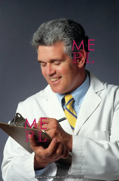  : SMILING MAN DOCTOR WRITING ON CLIPBOARD CHART