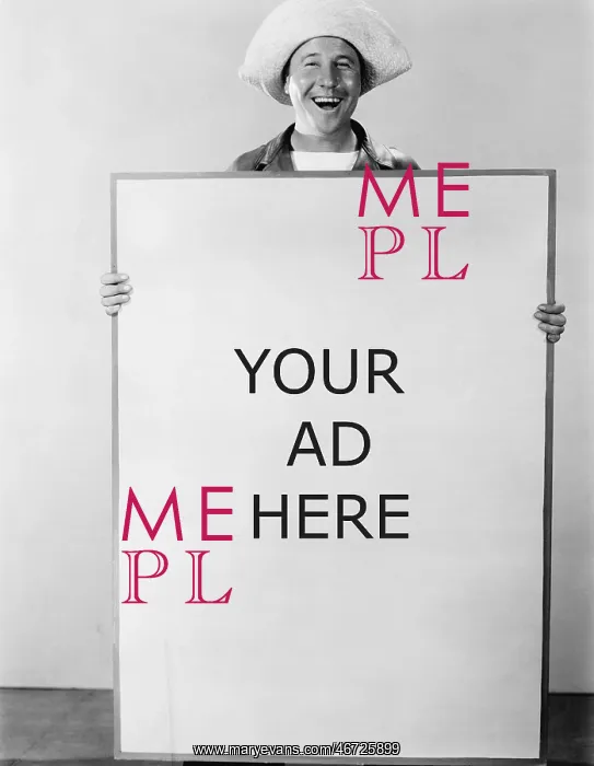  : Smiling man holding sign