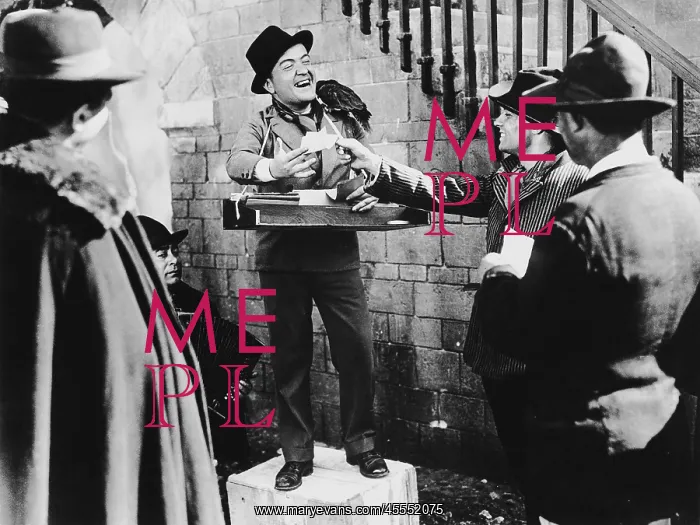 : Smiling man taking bets in the street : Smiling man taking bets in the street