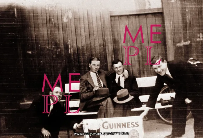  : Four smiling men with Guinness advert