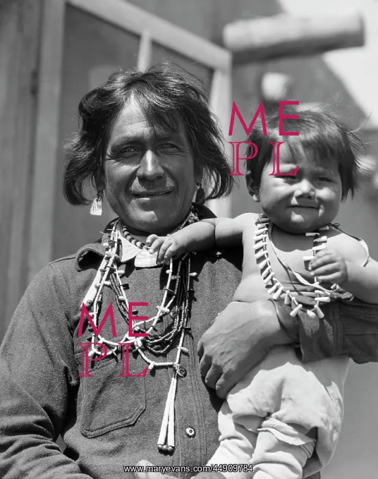 : Smiling Native American Man Looking at Camera Holding His : Smiling Native American Man Looking at Camera Holding His