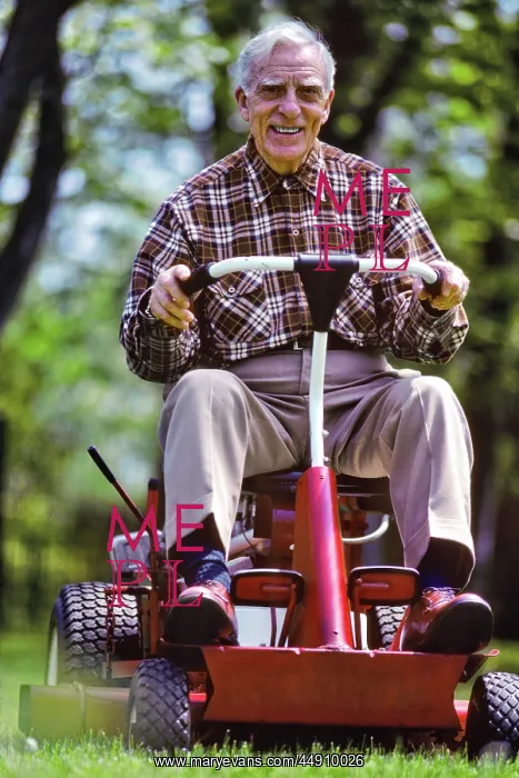: Smiling Older Man on Riding Mower Mowing Lawn : Smiling Older Man on Riding Mower Mowing Lawn