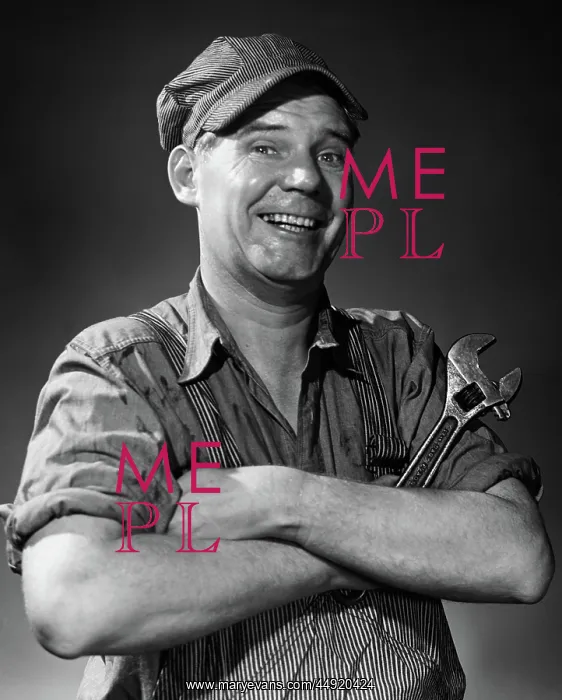 : Smiling portrait man in striped cap & overalls : Smiling portrait man in striped cap & overalls