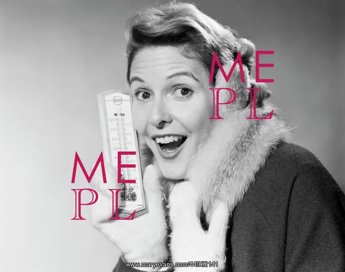 : Smiling Woman Looking at Camera in Winter Cold Holding The : Smiling Woman Looking at Camera in Winter Cold Holding The
