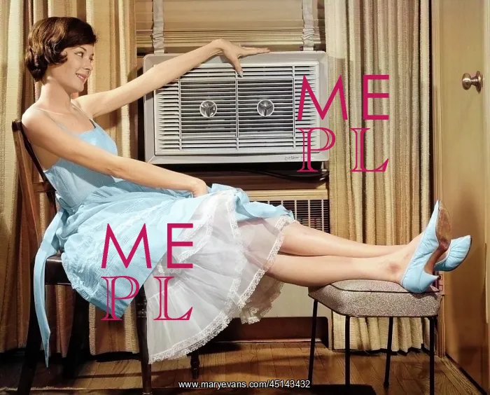 : Smiling Woman Sitting Propping Legs up on Stool : Smiling Woman Sitting Propping Legs up on Stool