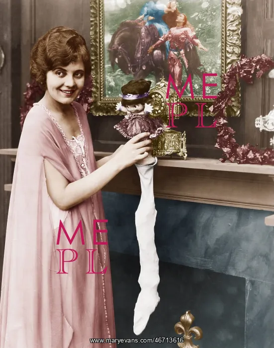 : Smiling woman stuffing Christmas stocking : Smiling woman stuffing Christmas stocking