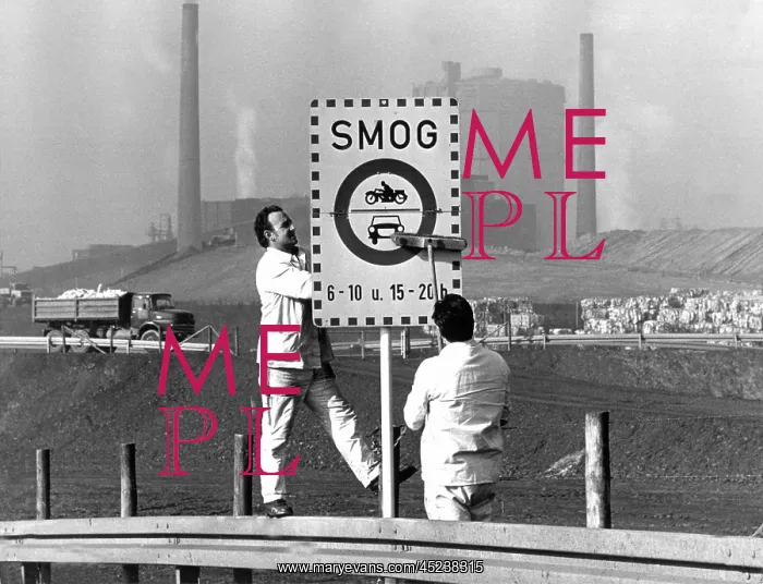 : Smog sign in front of industrial scenery : Smog sign in front of industrial scenery