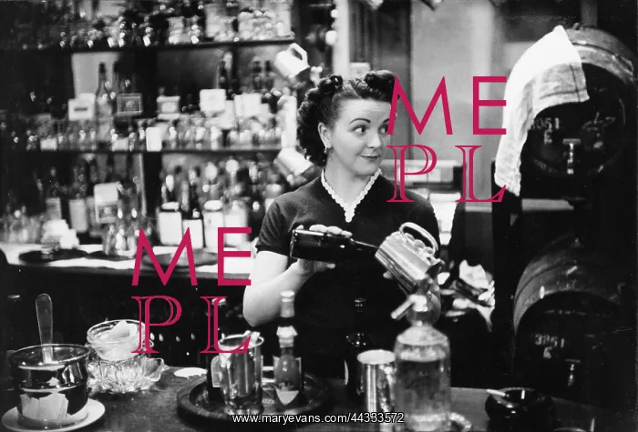 : Soho barmaid at work : Soho barmaid at work