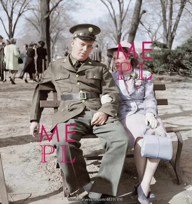 : Soldier and friend sit on a park bench in : Soldier and friend sit on a park bench in