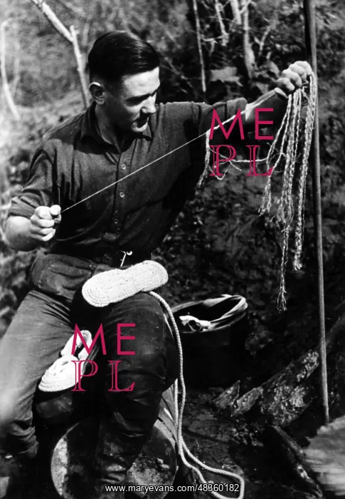 : Soldier making a bunker shoe, 1942 : Soldier making a bunker shoe, 1942