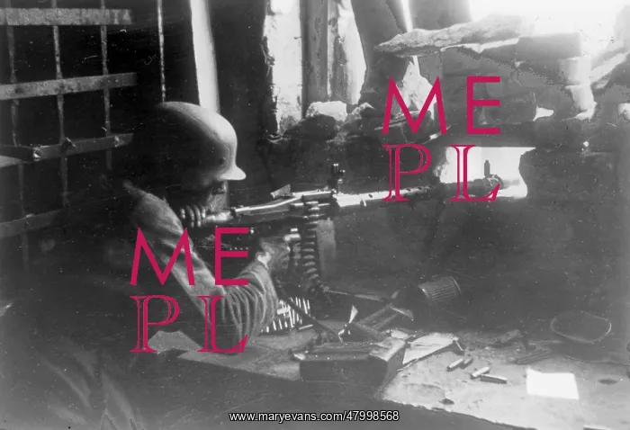 : Soldier with an MG 34 shoots through an embrasure : Soldier with an MG 34 shoots through an embrasure