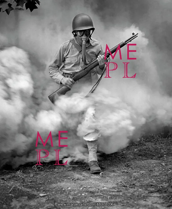  : Soldier with rifle during gas mask training at