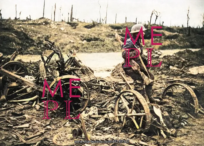 : Soldier waiting by old farm machinery, Western Front, WW1 : Soldier waiting by old farm machinery, Western Front, WW1