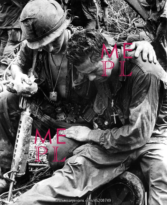 : Two soldiers comfort each other under the ? : Two soldiers comfort each other under the ?