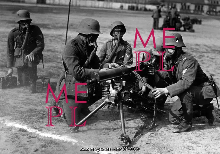 : Soldiers with gas masks during a target practice at a ma : Soldiers with gas masks during a target practice at a ma
