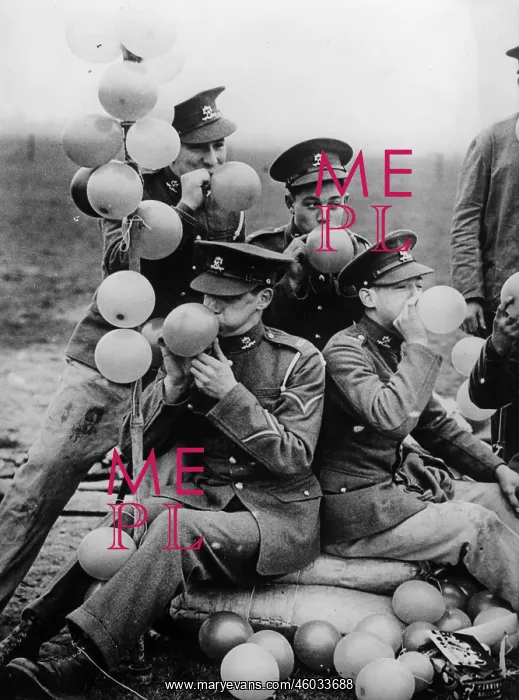 : Soldiers inflating balloons : Soldiers inflating balloons