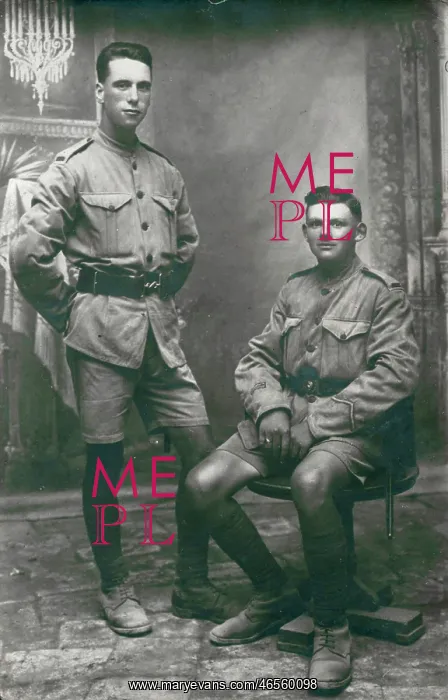 : Two soldiers in khaki uniform : Two soldiers in khaki uniform
