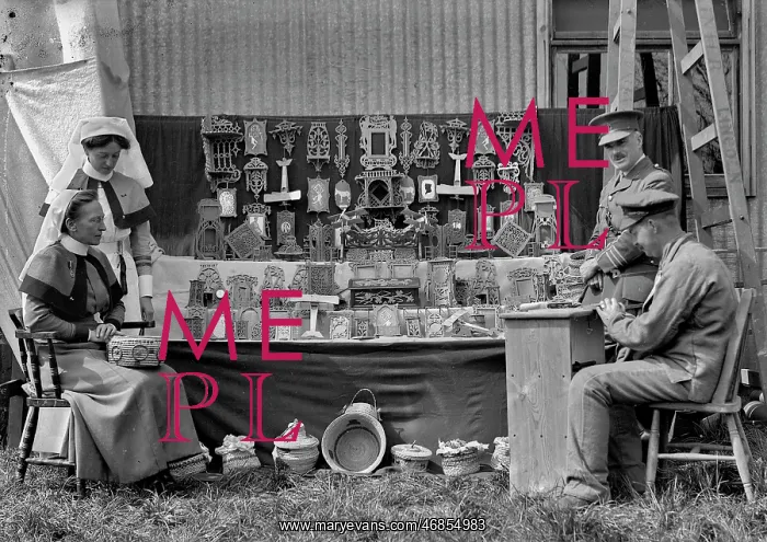 : Two soldiers and two nurses at sale of work, WW1 : Two soldiers and two nurses at sale of work, WW1
