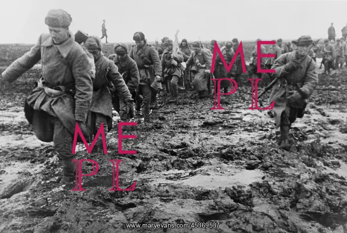 : Soviet (Russian) soldiers marching through a muddy : Soviet (Russian) soldiers marching through a muddy